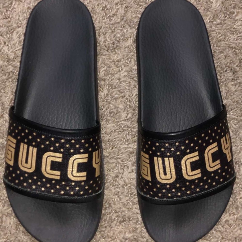 Black and Gold Gucci slides size 10